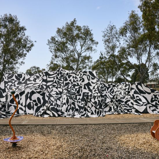 Outdoor black and white mountain sculpture created by artist Hari Koutlakis